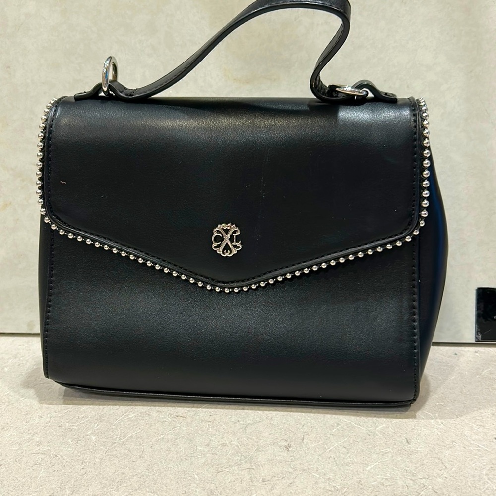 Black purse with silver beaded details
